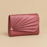 Fan Fold Satin Clutch · Rosewood, studio photo