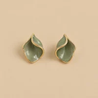 Petal Fold Studs · Sage, studio photo