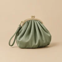Pleated Pouch with Fold Frame · Sage, studio photo