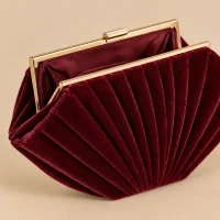 Velvet Fan Frame Clutch · Bordeaux, close-up of the detail