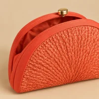 Woven Fan Clutch · Coral, close-up of the detail